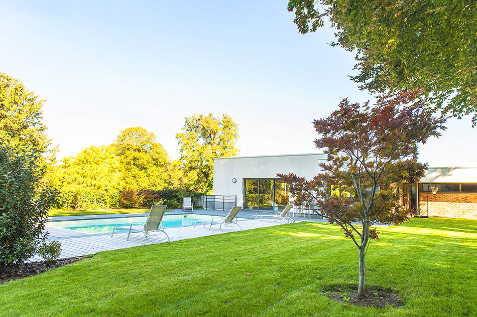 Photo 4 – un aménagement paysager avec une piscine